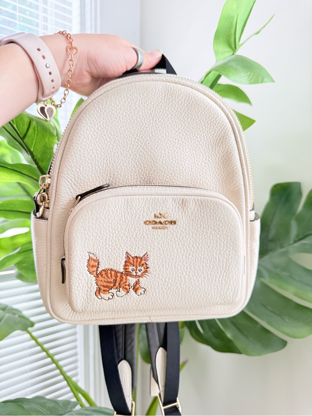 Coach mini court backpack dancing kitten